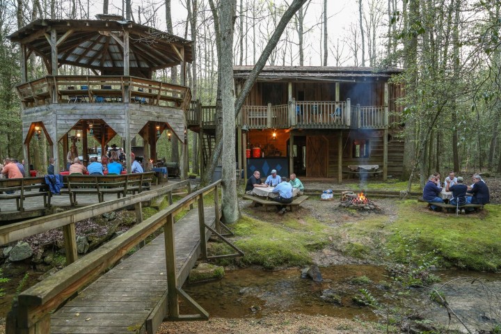 a group of people sitting at a train station
