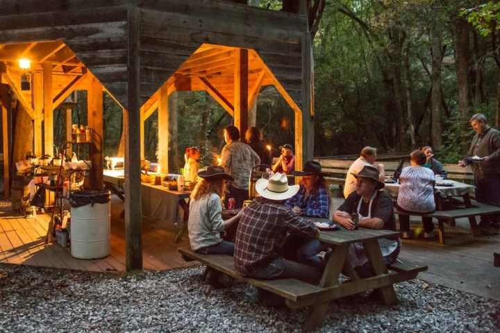 a group of people sitting at a table